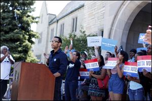 Ohio-native John Legend, a Grammy Award winning singer, encourages students to register to vote and to volunteer for the re-election campaign of President Obama at the University of Toledo.