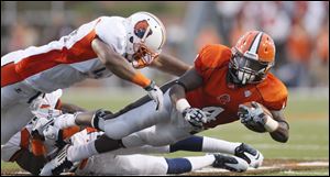 BGSU's Jordan Hopgood, shown carrying the ball in a game last year, has received a 1 game suspension. 