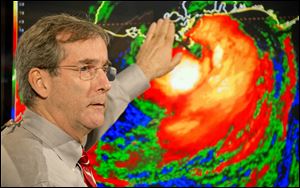 National Hurricane Center Deputy Director Ed Rappaport briefs a national television audience on the progress of Hurricane Isaac Tuesday, at the NHC in Miami. Isaac made landfall along the Louisiana coast of Plaquemines Parish,  just southwest of mouth of the Mississippi River. The storm was classified as a Category 1 hurricane with 80 mph sustained winds.