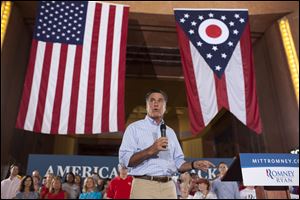 Mitt Romney addresses the Union Terminal crowd. He was joined onstage Saturday by several Ohio Republicans.