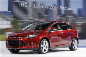 The Focus bested the Corolla by 27,000 in 2012's first half, Ford says.