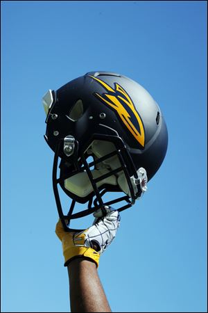 The Rockets' 17 seniors gave their approval on new helmets, which dropped the 'Toledo.'
