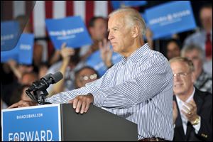 Vice President Joe Biden addresses UAW members at a union hall in northeast Ohio's Lords- town. In his remarks there Friday, he said auto plants across the country would have closed without President Obama's support for funds to rescue the industry.