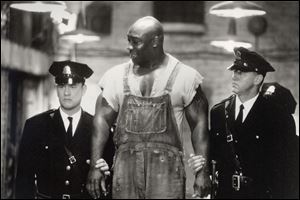Tom Hanks, left, Michael Clarke Duncan, center, and David Morse in 