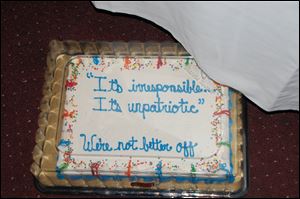 Democrats supplied breakfast, but Ohio Republicans offered dessert at the Democratic National Convention Wednesday. A cake arrived at the Democrats' morning meeting with the words 