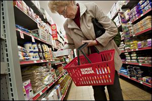 Customer Helen Buckley shops at a Family Dollar Store in Sterling, Ill. The discount store chain is joining many others in adapting stores to accommodate the aging population.