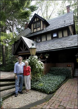 Ramona Smith, right, with her son, Mark D. Smith, at her home in Akron that was once the poultry keeper’s cottage for the nearby Stan Hywet estate, which includes the seventh-largest home in the United States.