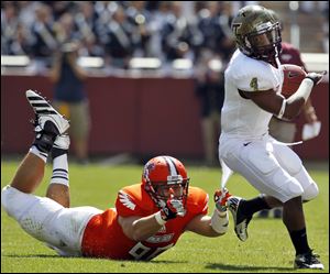 Bowling Green's Corey Marshall tries to pull down Virginia Tech' J.C. Coleman.