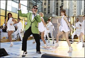 South Korean rapper Psy performs his massive pop hit 'Gangnam Style' live on NBC's 