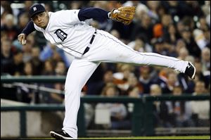 Detroit Tigers third baseman Miguel Cabrera fields a bunt from Alcides Escobar in the sixth inning Tuesday in Detroit.