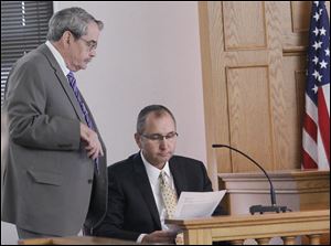 Assistant Lucas County Prosecutor John Weglian questions Robin Horvath.