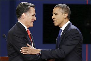 Republican presidential nominee Mitt Romney and President Obama shake hands after the first presidential debate at the University of Denver last week.