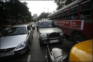 Vehicles creep along a thoroughfare in Mumbai. The booming Indian car market has intensified challenges. Traffic can be so dense that it takes hours to travel 15 miles in a busy city.