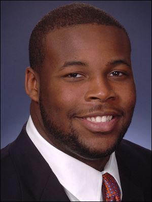 Tim Kynard, graduate of St. John's Jesuit High School, plays as a defensive lineman for the University of Illinois football team.