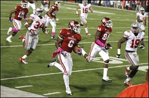 Indiana's Tevin Coleman (6) returns a punt 60 yards during the second half of an NCAA college football game against Ohio State in Bloomington, Ind. on Saturday.