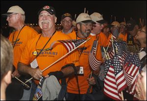 Marine Corp. Vietnam vet James Ballinger, of Whitehouse, is all smiles as he returns to Grande Air  hangar in Toledo from the Honor Flight trip to Washington D.C.