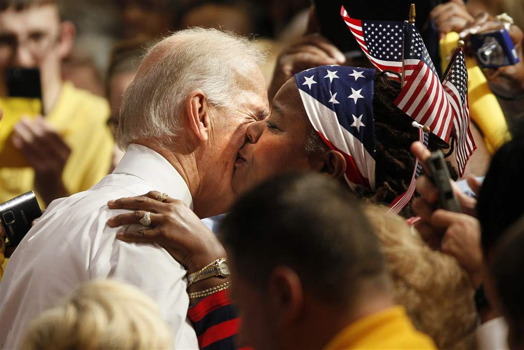 CTY-Biden24p-lady-flags