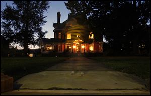 A ghostly image of reporter Kirk Baird appears at the Mansion View Inn, 2305 Collingwood Boulevard.