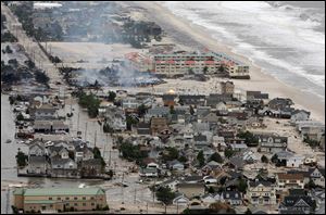 Damage north of Seaside, N.J. can be seen after superstorm Sandy made landfall in Monday evening.