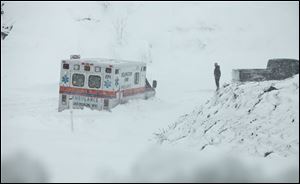 Superstorm Sandy buried parts of West Virginia under more than a foot of snow on Tuesday, cutting power to at least 264,000 customers and closing dozens of roads.