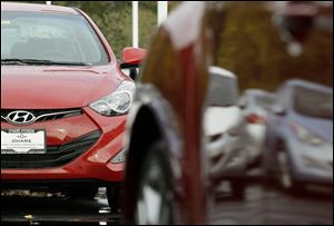 A Hyundai Elantra is seen inside of a Hyundai car dealership in Des Planines, Ill. 