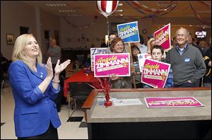 Angela Zimmann and supporters watch election results in Rossford. Ms. Zimmann lost to incumbent U.S. Rep. Bob Latta (R., Bowling Green).