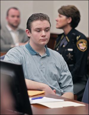 Brogan Rafferty looks on in the courtroom of Judge Lynn S. Callahan in the Summit County Courthouse.