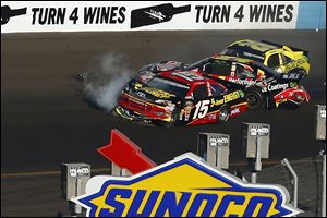 From left, Clint Bowyer (15), Jeff Gordon and Joey Logano crash in Turn 4 during the NASCAR Sprint Cup Series race at Phoenix International Raceway.