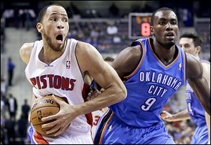 The Pistons' Tayshaun Prince (22) drives on the Thunder's Serge Ibaka (9). Detroit kept the game close and led for most of the contest but fell to 0-8 this season.