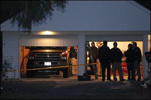 The house at 5142 Harvest Lane in West Toledo is where 2 adults and 3 children were found dead.