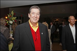 Board president Dick Fuller poses for a photograph during the the 4th Annual Heartwarming Party to benefit Ronald McDonald House Charities.