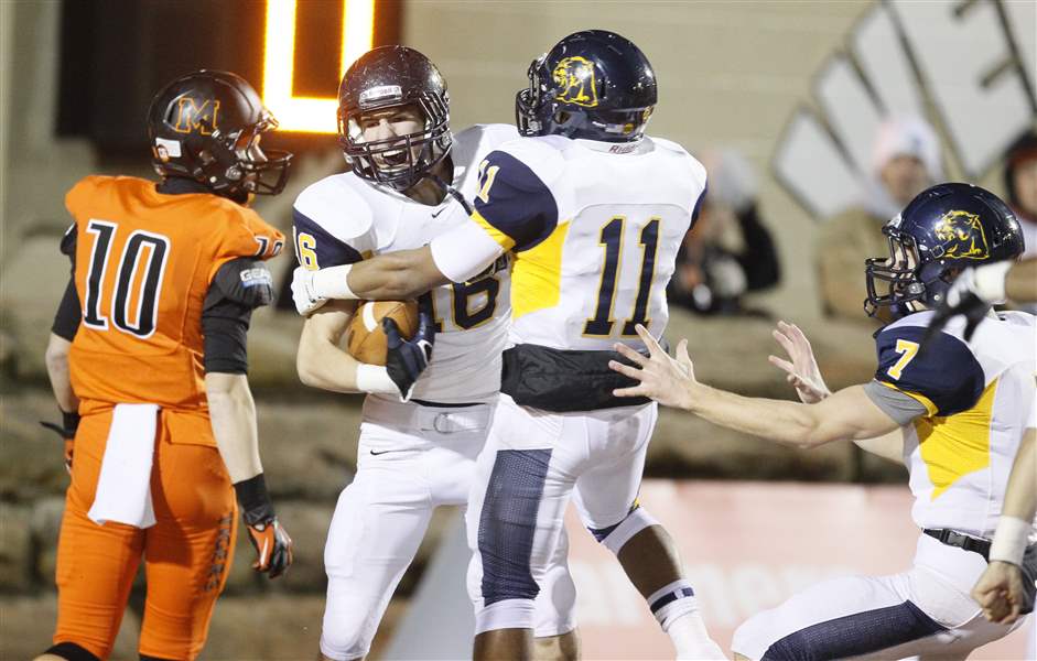 Whitmer-football-celebrates
