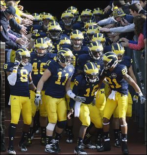 In another chapter in the Michigan versus Ohio State rivalry, the Wolverines hope to play spoiler to the Buckeyes pursuit of perfection.