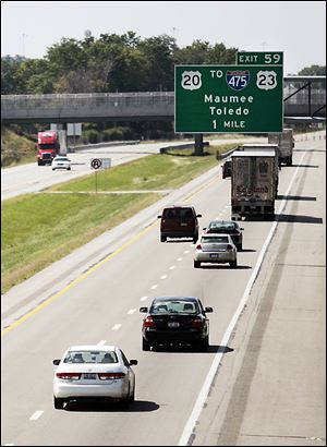 Vehicles head east and west on the Ohio Turnpike near Maumee. Gov. John Kasich wants to sell bonds backed by turnpike tolls to finance road projects across the state.