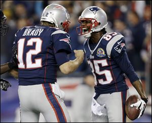 Tom Brady threw for four touchdowns and 296 yards against Houston on Monday night in Foxborough, Mass.