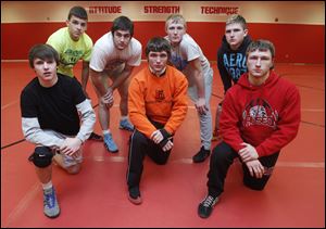 Wauseon will look to win a Northwest Ohio Athletic League wrestling title with (front, from left) Zach Morrow, Austin Yarnell, and Jacob Whitcomb, and (back) Wade Hodges, Zane Krall, Aaron Schuette, and Alec Vonier.