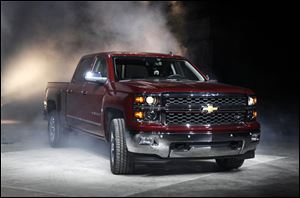 The 2014 Chevrolet Silverado debuts in Pontiac, Mich., to some good reviews. The models roll into a market where truck sales are growing after a five-year slump. There are expectations that the new models, including the GMC Sierra, will boost General Motors’ sales.