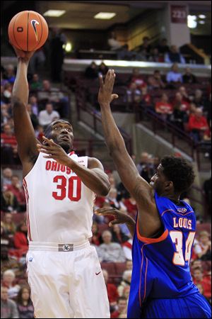 Ohio State's Evan Ravenel shoots over Savannah State's Arnold Louis.