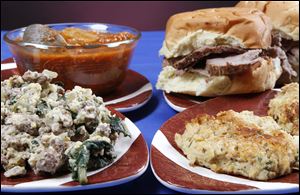 Clockwise from bottom left, Joe's Special, cioppino, pit beef sandwich and crab cakes.