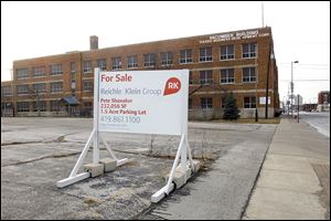 The Macomber building dates to 1938. It was used as a vocational high school for boys and operated with the nearby Whitney High School for girls beginning in 1959. Toledo Public Schools closed both schools in 1991, and Macomber was sold in 1998. The Cherry Street Mission deal hinges on the outcome of an engineering report.