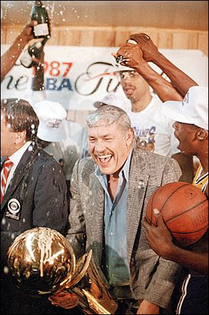 Los Angeles Lakers owner Jerry Buss celebrates the 1987 championship.