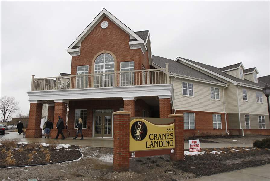 Cranes Landing, apartment complex for seniors, dedicated in North