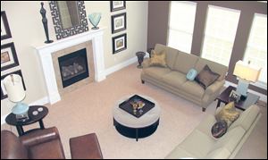 The impressive great room, seen from the catwalk above, is an inviting gathering space.