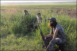 From left, Phil Robertson, Si Robertson, and Jase Robertson in 
