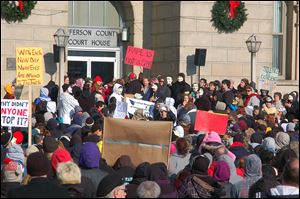 Activists from the online group KnightSec and Anonymous protest at the Jefferson County Courthouse in Steubenville, Ohio.