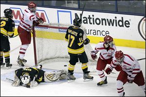 Northview junior goaltender David Marsh puts his head down after Shaker Heights scores in the third period of the state championship game Saturday at Nationwide Arena in Columbus. The Wildcats finish the season with a 27-7-1 record.