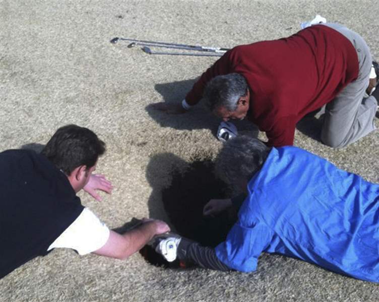 Golfer-Illinois-Sinkhole