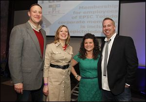 From left:  Event chairman Mark Fox, Sheri Copanic, Colleen Tankoos and Jeff Schaaf attend the EPIC Toledo event at the Premier Banquet Hall.