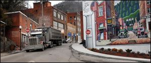 A record number of U.S. counties — more than 1 in 3 — are now dying off, hit by an aging population and weakened local economies that are spurring young adults to seek jobs elsewhere. New 2012 census estimates highlight the population shifts.