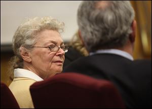 Sandra Layne, left, looks at her lawyer Jerome Sabbota during closing arguments in her trial at the Oakland County Circuit Court in Pontiac, Mich.